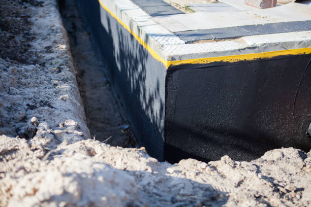 Professional Waterproofing technician working in Middlesex, NJ